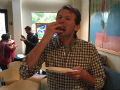 Jeff Adler eating a sandwich